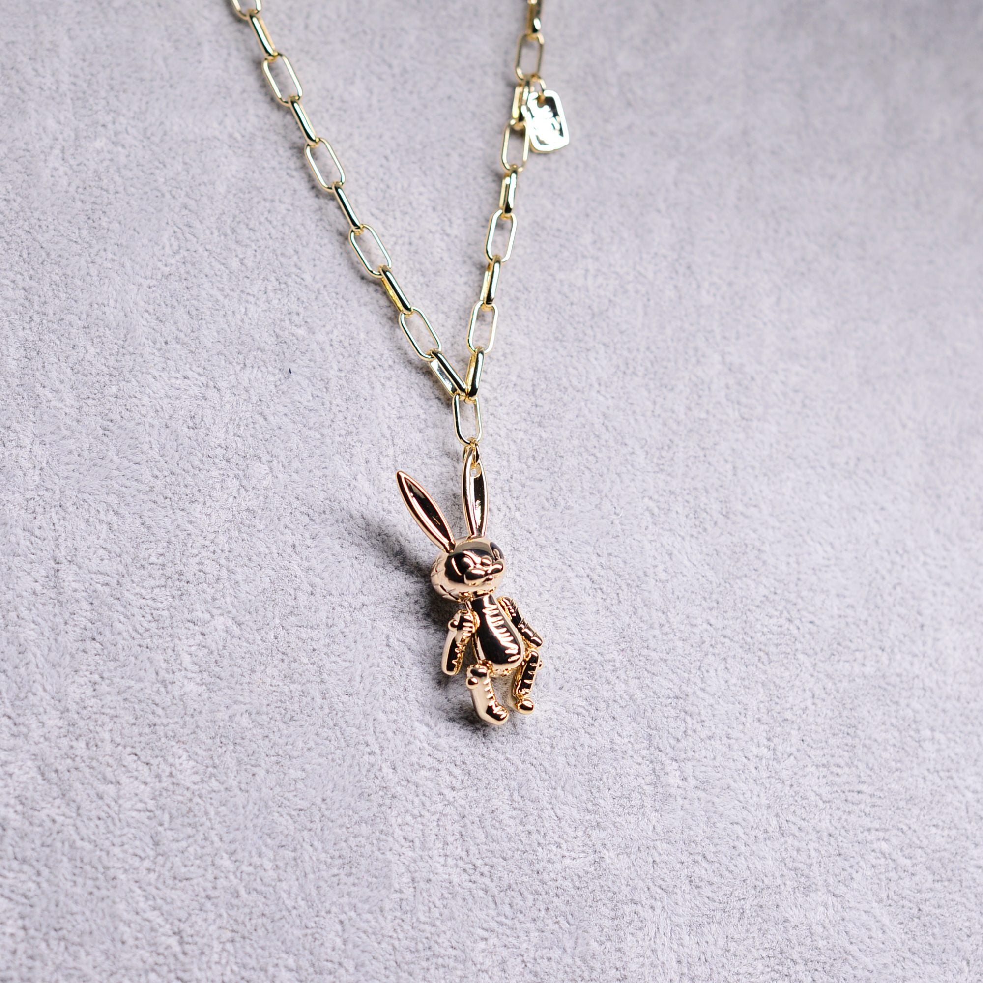 Playful bunny pendant necklace