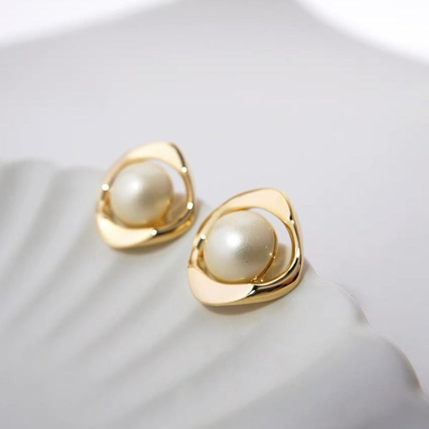 Delicate and Opulent pearl stud earrings