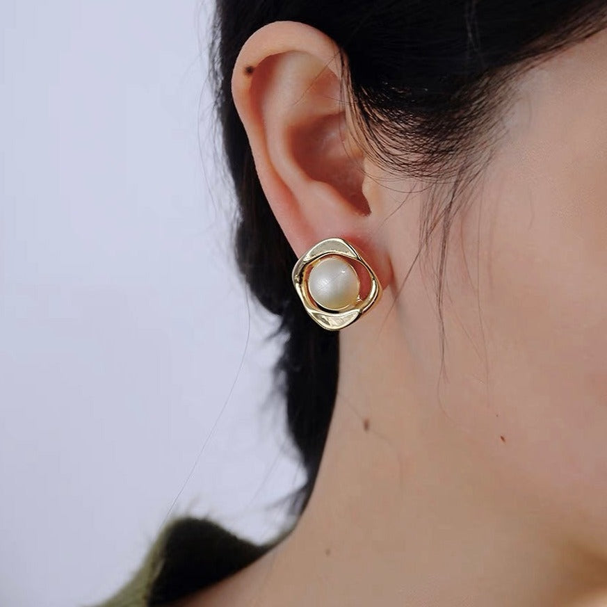 Delicate and Opulent pearl stud earrings