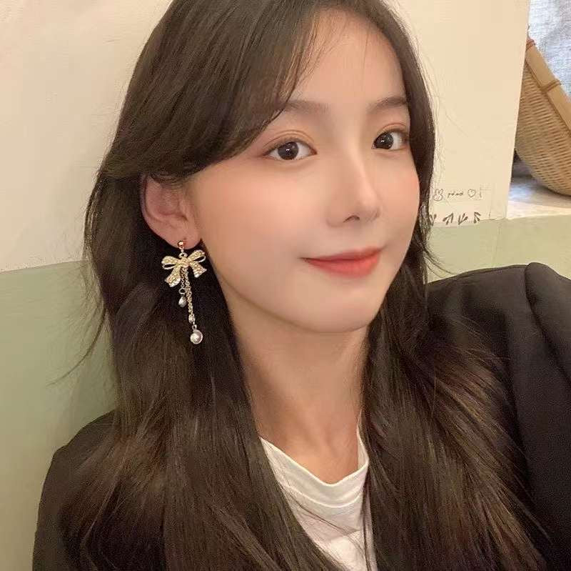 Glamorous Bow Tie Tassel Earrings