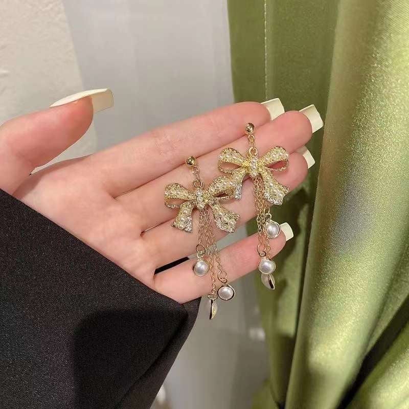 Glamorous Bow Tie Tassel Earrings