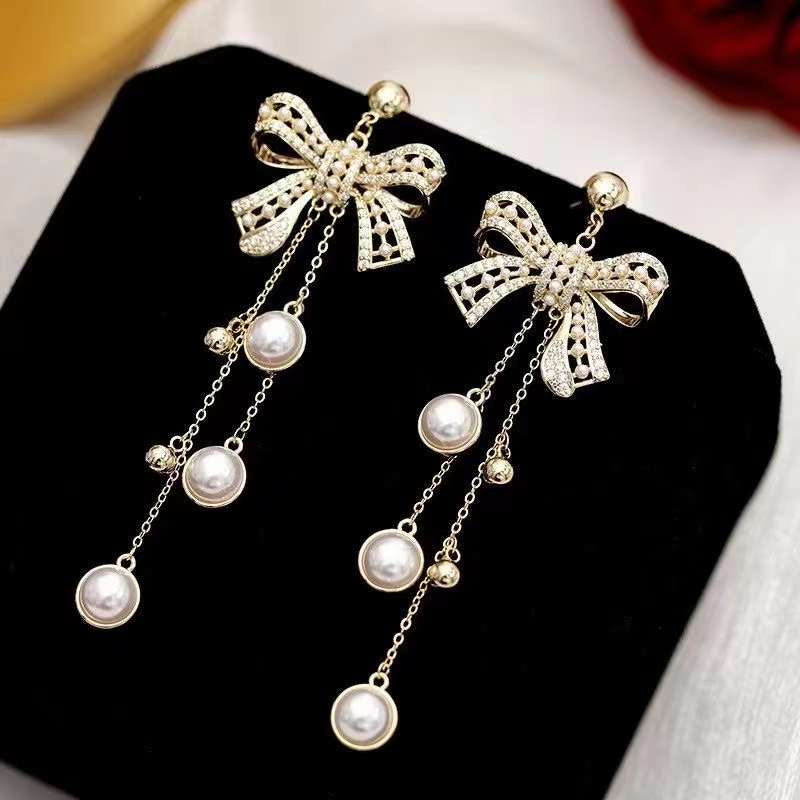 Glamorous Bow Tie Tassel Earrings
