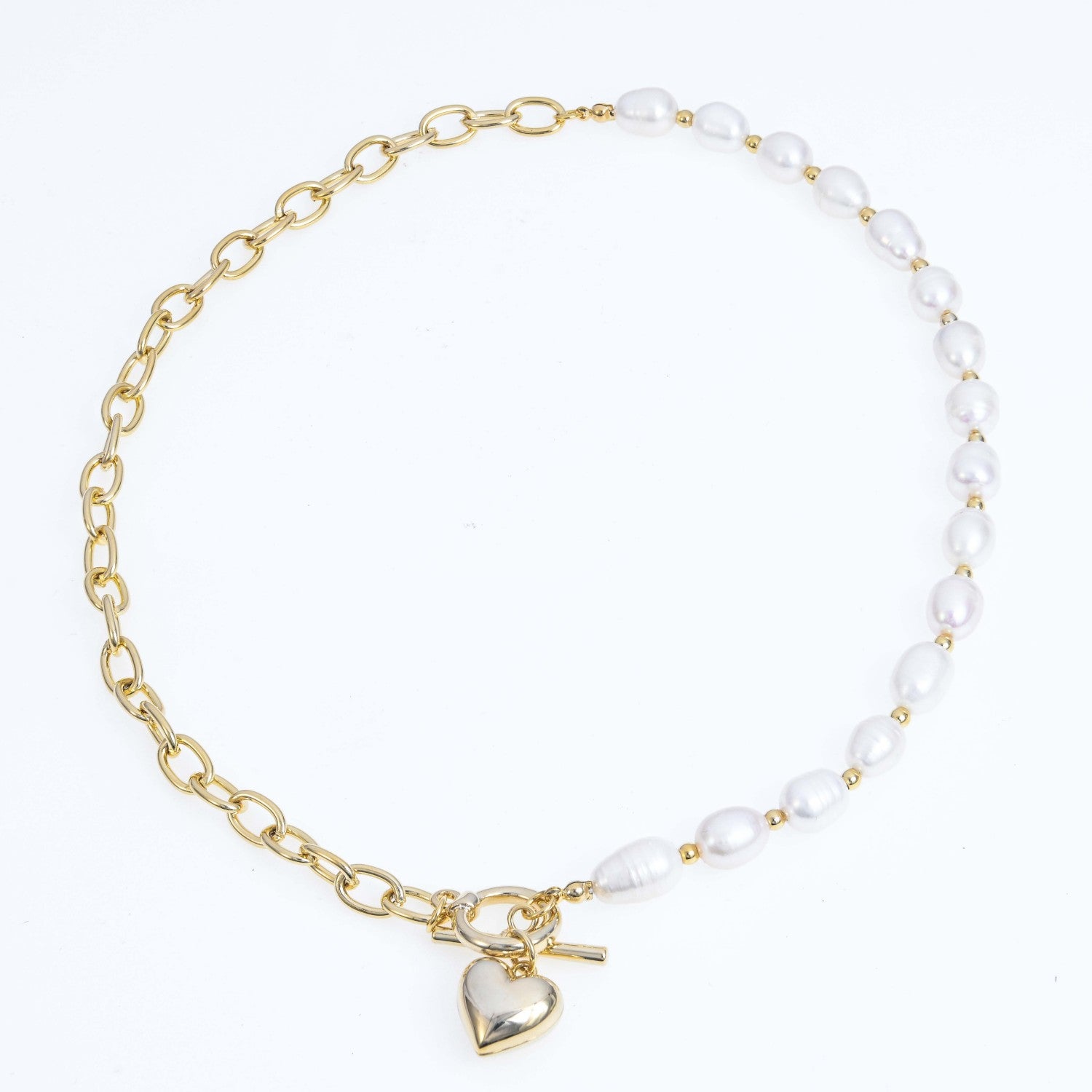 Natural pearl in belcher fob heart necklace