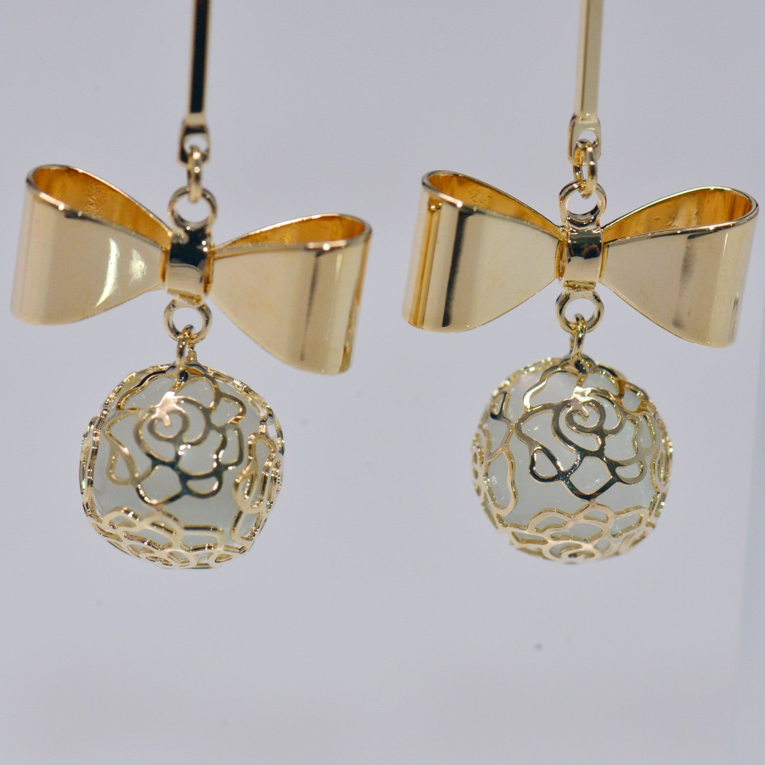 Filigree lab opal bowtie earrings