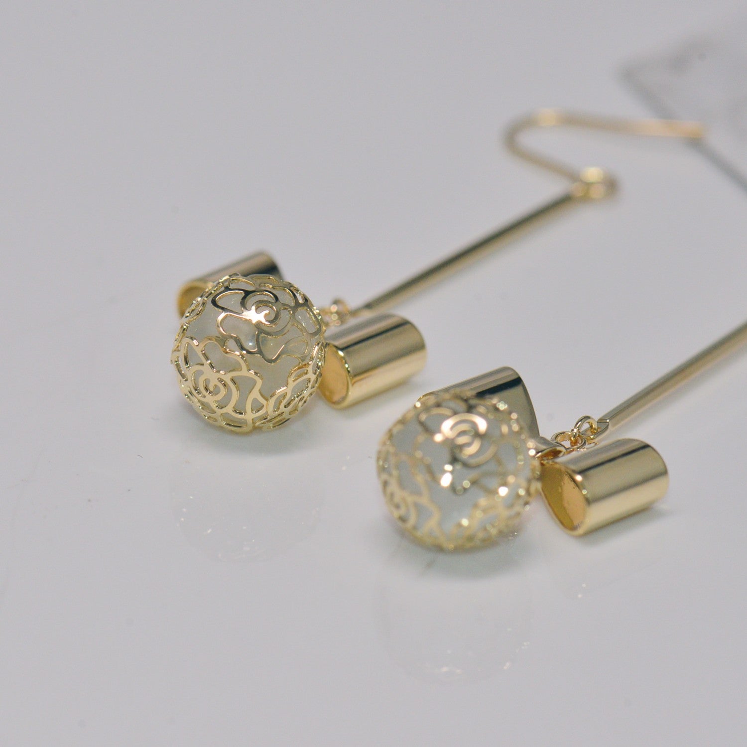Filigree lab opal bowtie earrings