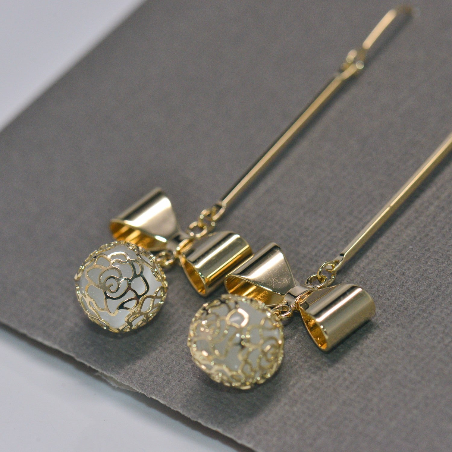 Filigree lab opal bowtie earrings